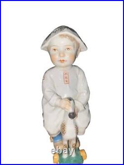 1900's Meissen Konrad Hentschel Child with Paper Hat German Porcelain Figurine 1900's Meissen Konrad Hentschel Child with Paper Hat German Porcelain Figurine