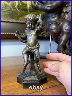 19th century French Louis XVI Style Patinated Bronze Cherub Figurine