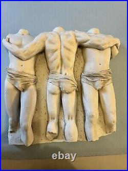 3 men torso plaster wall sculpture