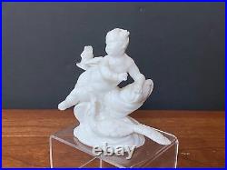 Antique Nymphenburg Germany figurine Cherub, Putti with Peacock, Glazed