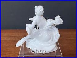 Antique Nymphenburg Germany figurine Cherub, Putti with Peacock, Glazed