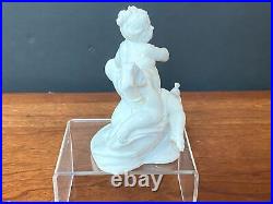 Antique Nymphenburg Germany figurine Cherub, Putti with Peacock, Glazed