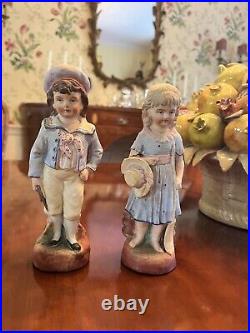 Bisque figurine pair