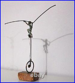 Bronze Balance Sculpture by Bijan Boy on Unicycle Marble Base