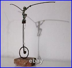 Bronze Balance Sculpture by Bijan Boy on Unicycle Marble Base