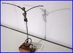 Bronze Balance Sculpture by Bijan Boy on Unicycle Marble Base