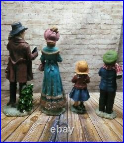Christmas 4pc Resin Carollers Holiday Singing Family 23 21 17 14 tall