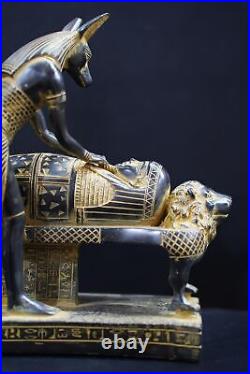 Egyptian god Anubis, the god of mummification, mummify King Tutankhamun