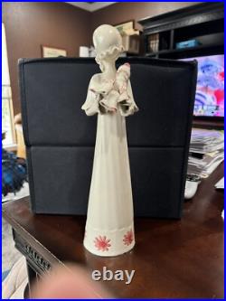 Five Different Louise Auger Figurines