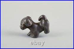 Just Andersen (1884-1943), Denmark. Rare and early puppy in disco metal