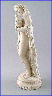 Large English Minton biscuit figure of woman. Classic high quality figure