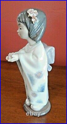 Lladro # 6151 Figurine BEARING FLOWERS Original Box Retired MINT CONDITION