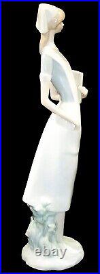 Lladro Professionals Nurse with Charts Porcelain Figurine, #4603, 14.25 High