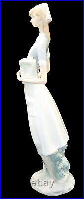 Lladro Professionals Nurse with Charts Porcelain Figurine, #4603, 14.25 High