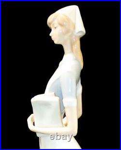 Lladro Professionals Nurse with Charts Porcelain Figurine, #4603, 14.25 High