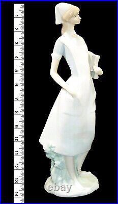 Lladro Professionals Nurse with Charts Porcelain Figurine, #4603, 14.25 High