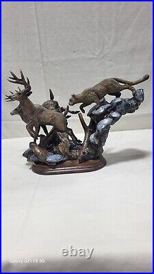 Mill Creek Studios Cougar Chasing Deer Composite Sculpture. Danny Edwards