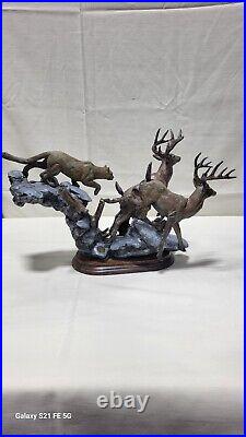 Mill Creek Studios Cougar Chasing Deer Composite Sculpture. Danny Edwards