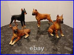 Morten's Studio Boxer Dog Figurines plus a Doberman