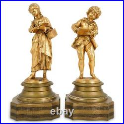 Pair of Tall Late 19th Century Continental Gilt Bronze Student Sculptures