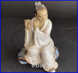 Porcelain Chinese Man Playing Flute