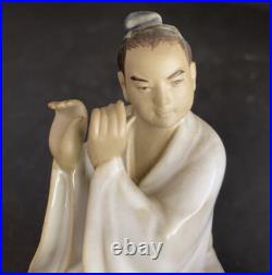 Porcelain Chinese Man Playing Flute