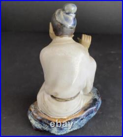 Porcelain Chinese Man Playing Flute