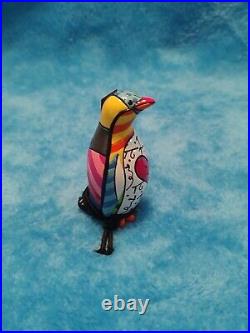 Romero Britto figurines penguin with tag attached