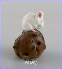 Royal Copenhagen porcelain figurine. Mouse on a chestnut. Early 20th century