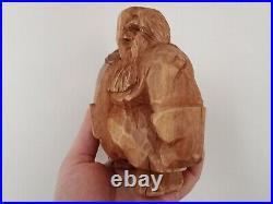 Sculpture of the god Odin made of wood. Statue of Wotan