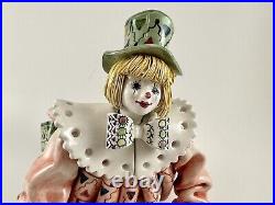 Smiling Porcelain Clown Laying On Belly, Blonde Hair, Green Hat, Made In Italy