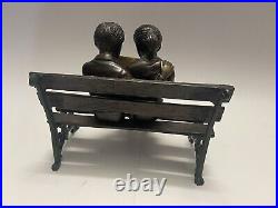 Two kids on bench reading a book Bronze Statue LOOK