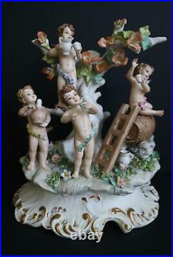 Vintage Italian capodimonte Wine putti angels porcelain group statue 1970