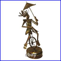 Vintage tin man Clown Sculpture character on unicycle with umbrella 32 Cm