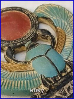 Winged Egyptian Scarab Sacred beetle with solar disk, ancient-inspired art