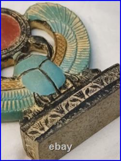 Winged Egyptian Scarab Sacred beetle with solar disk, ancient-inspired art